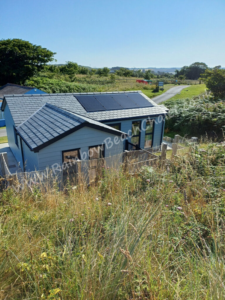 Picture of Rainbow Beach Chalet surrounded by grassy duneland